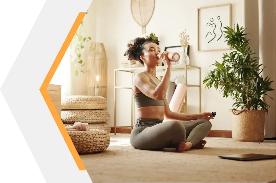 Lady on floor drinking water